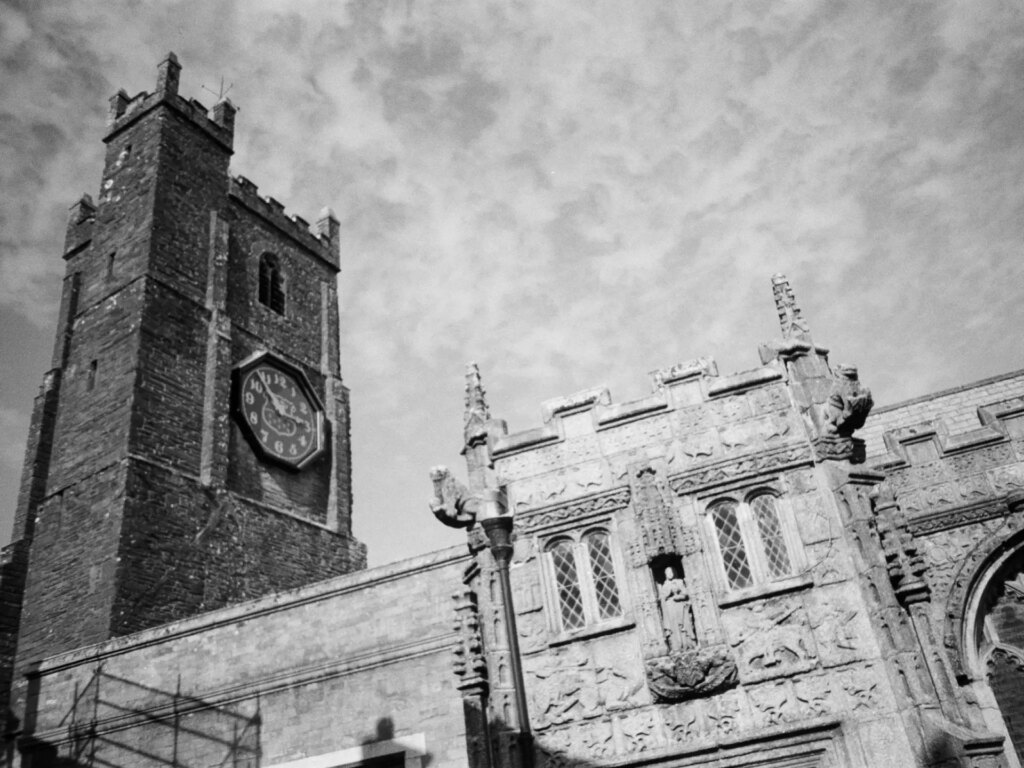 Exterior of church with church tower and clock