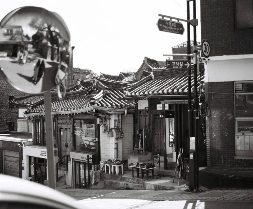 Some streets are passable by automobile, and these are now the streets of commerce, packed to the gills with cafés and clothing boutiques.