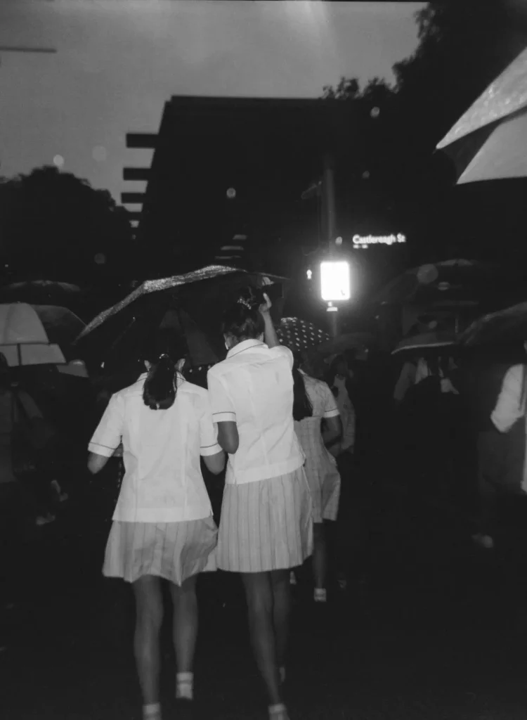 School girls with umbrella