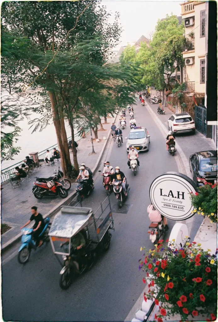 A busy street view from a balcony in Hanoi, Vietnam. 