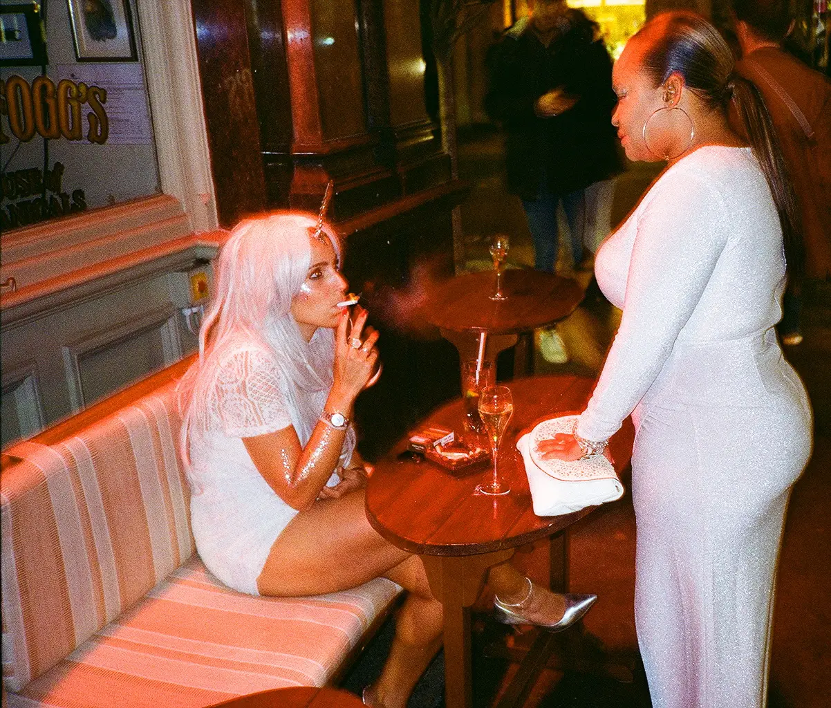 two women outside a pub