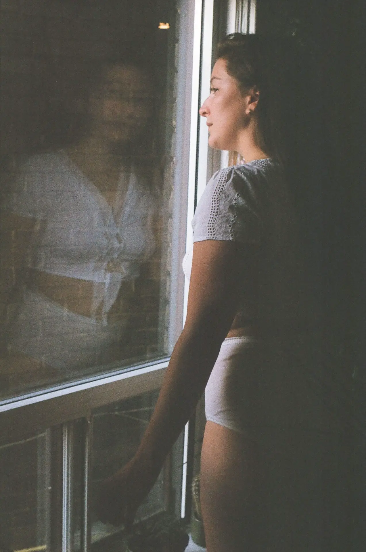 Girl looking out of the window