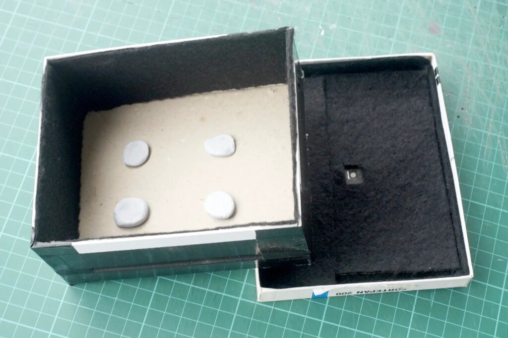 Completed parts of film box pinhole camera