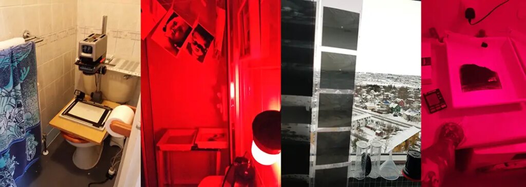enlarger on toilet, red light, darkroom prints, dolls, darkroom in shower, trays in shower, shower, negatives, developing equipment, developing trays, an arm, a washing machine