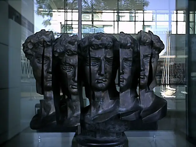 Bronze sculpture of David head, fragmenting