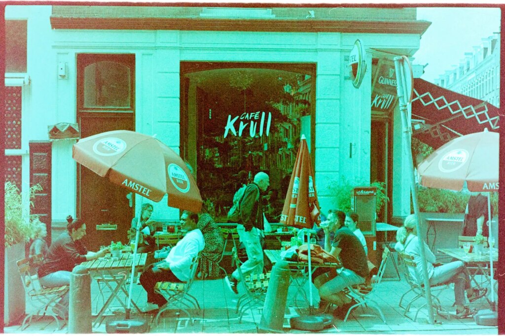 Cafe Krull, with its bright red Amstel Light umbrellas.