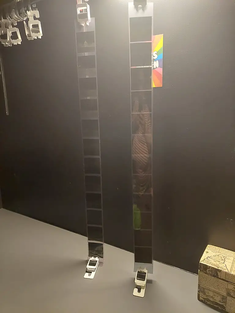 negatives, darkroom, hanging, clips, pot, counter top