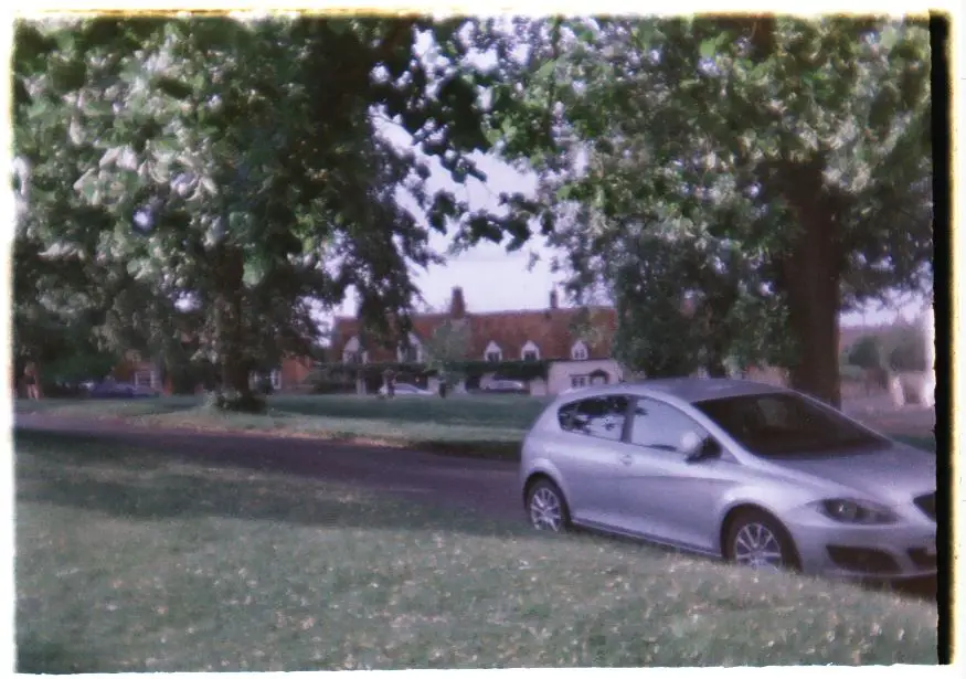 Car on a village green