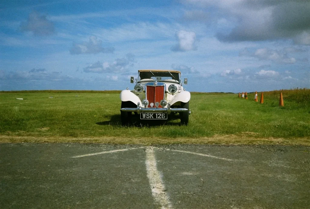 Olympus AF10 Twin photo of antique car with wide lens