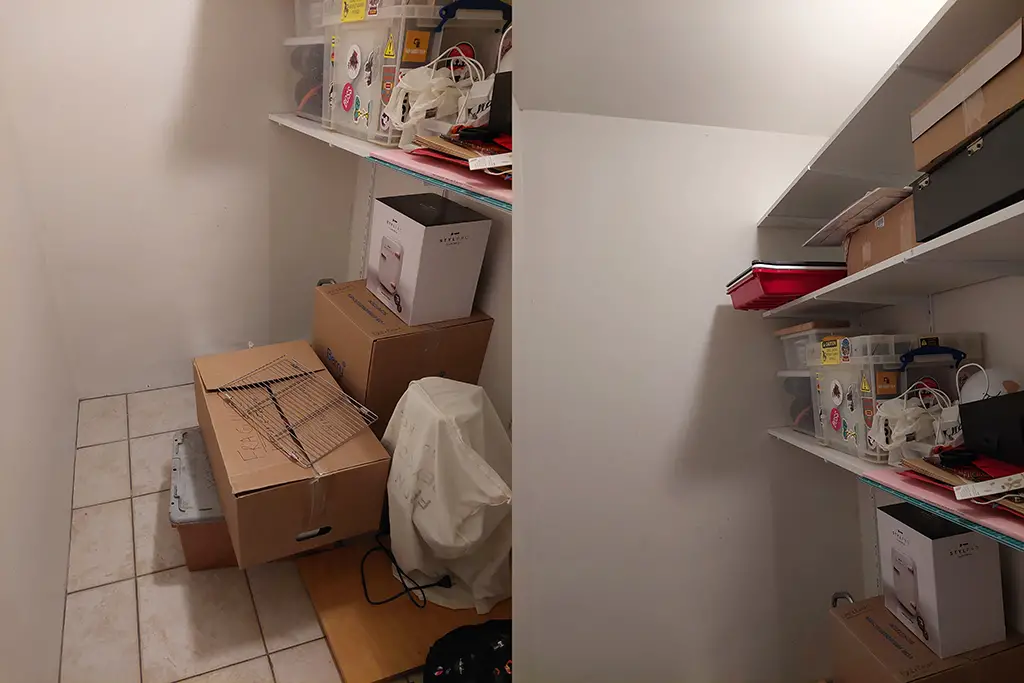 an empty storage room, boxes, darkroom equipment, white walls, storage space