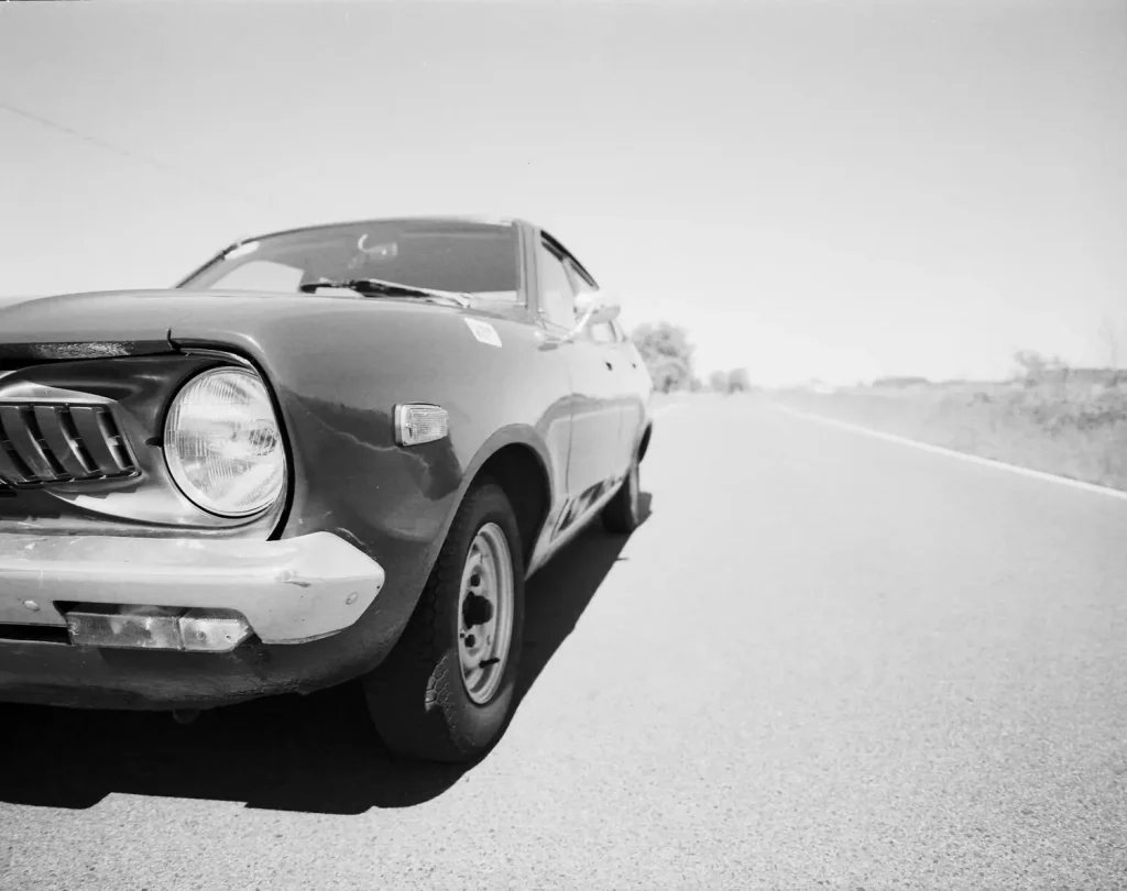 Datsun 120Y shot on Rollei RPX25 with Mamiya 7ii