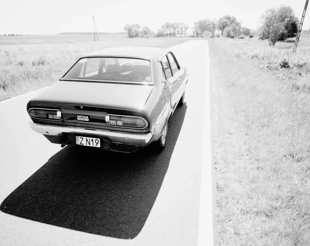 Datsun 120Y shot on Rollei RPX25 with Mamiya 7ii