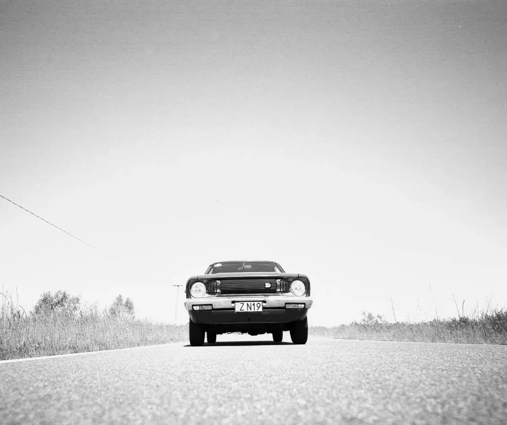 Datsun 120Y shot on Rollei RPX25 with Mamiya 7ii