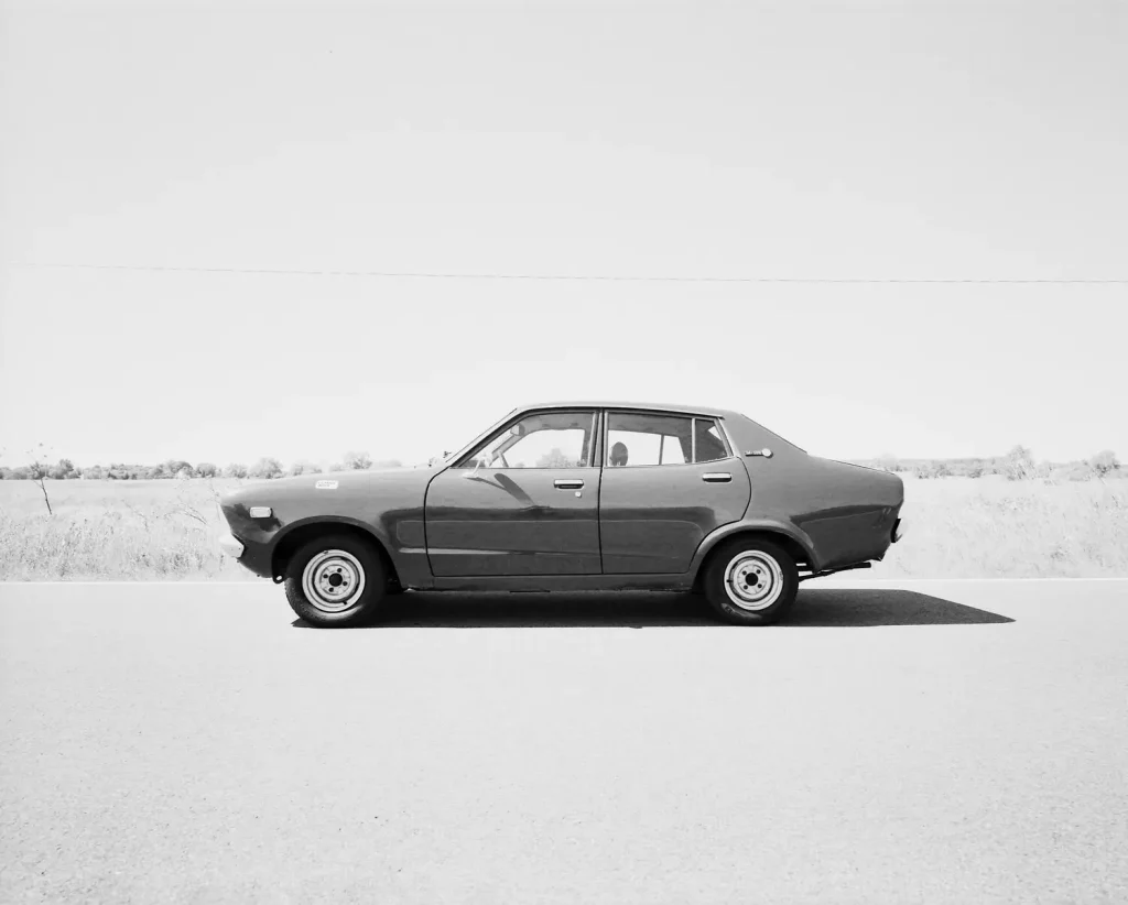 Datsun 120Y shot on Rollei RPX25 with Mamiya 7ii