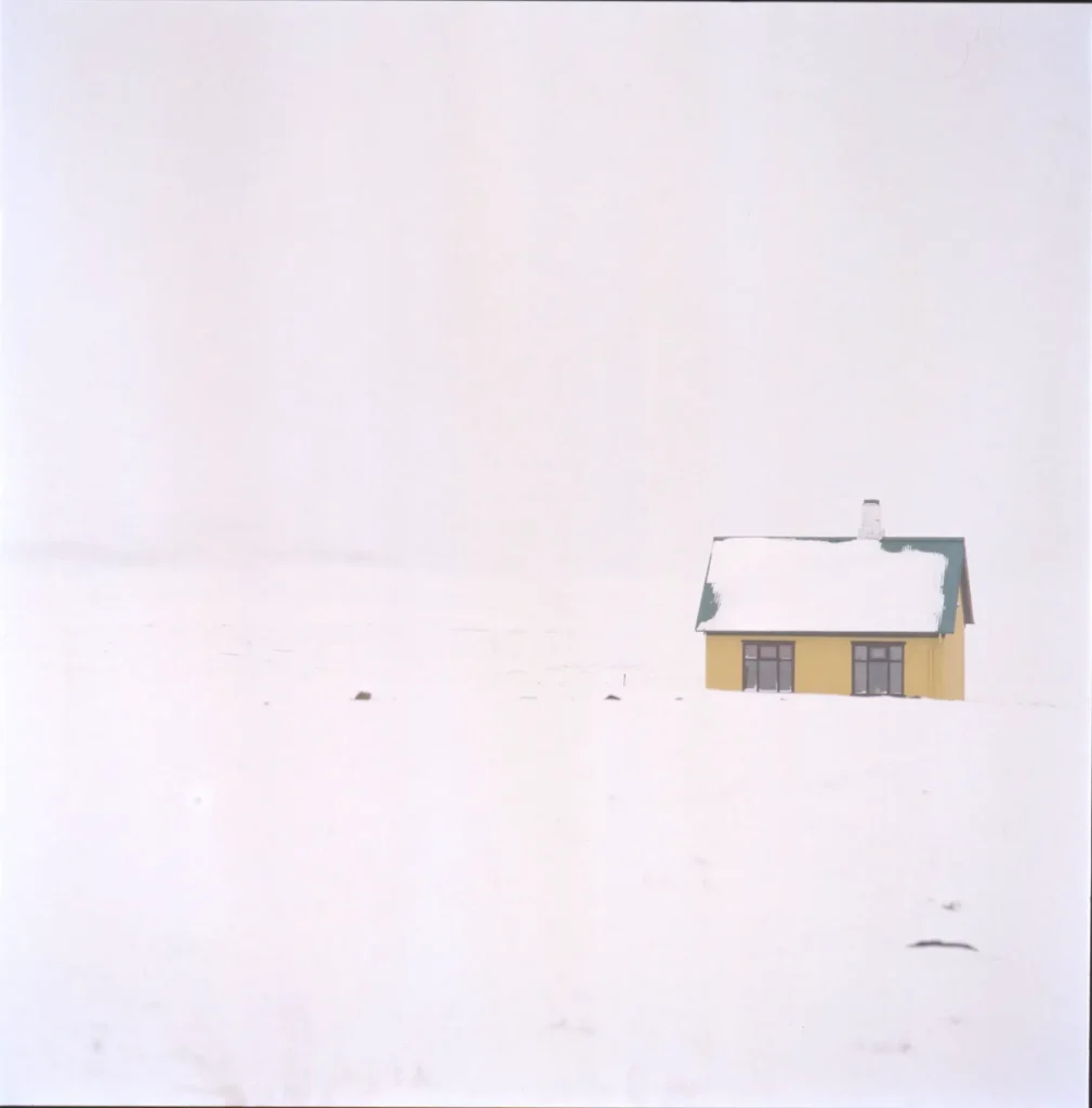 Yellow house in white out