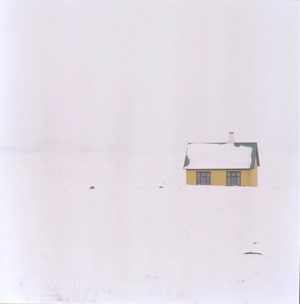 Yellow house in white out