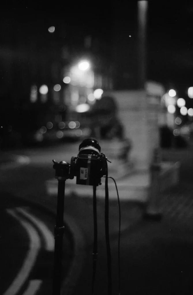 A camera on a tripod, marked "Fuji Press 800".