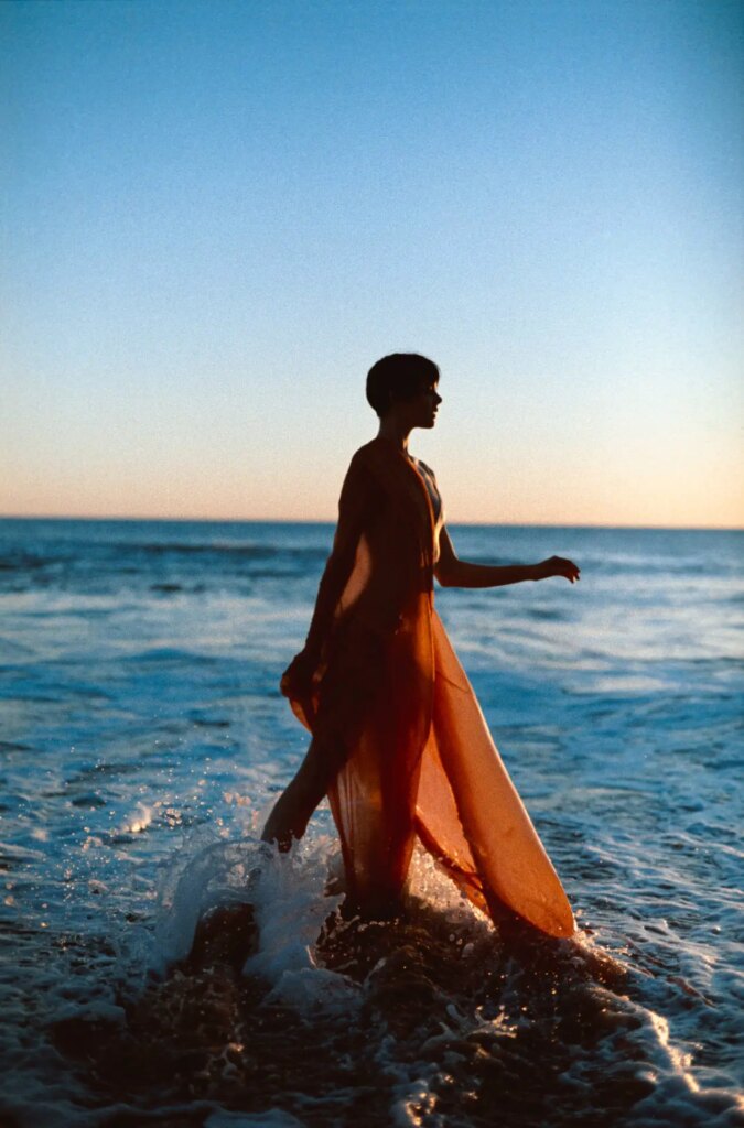 Sample image of person with dress in ocean on lomochrome color '92