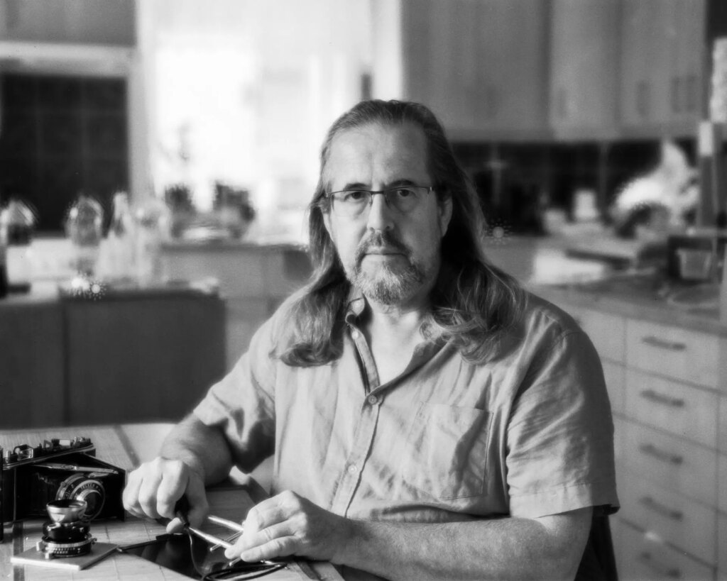 Portrait in a kitchen taken with Fujinon-SF with disk, wide open at f:5.6