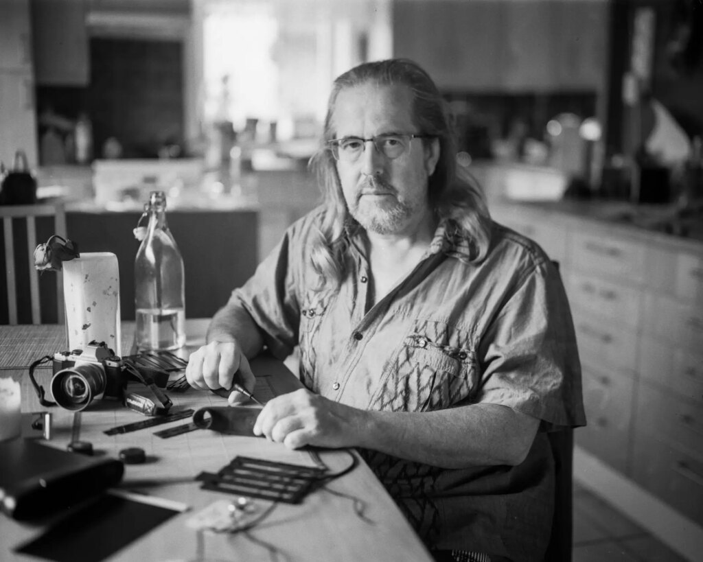 Portrait in a kitchen taken with front standard swing