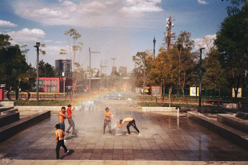 Kids playing with a Water Fountain Rainbow Mexico City 2019