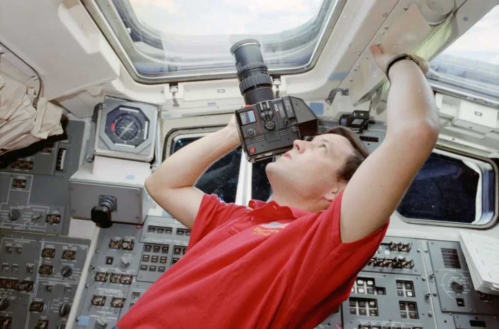 Rolleiflex 6008 with 250mm Sonnar and 90-degree prism finders on a Space Shuttle mission