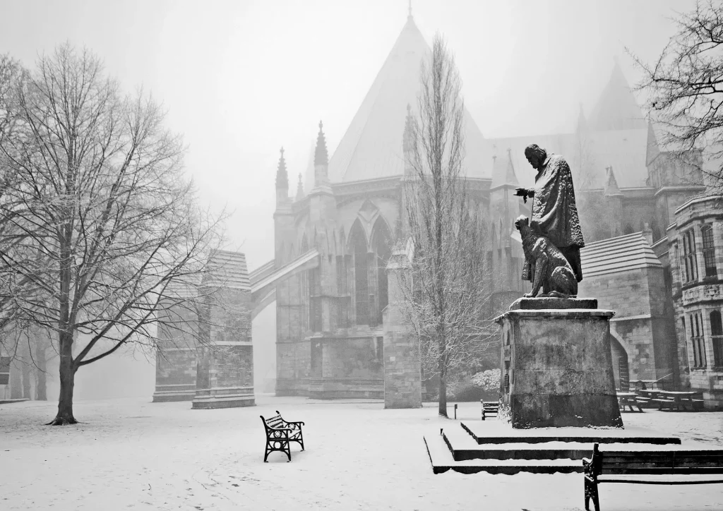 Snow on Lord Tennyson statue in lincoln