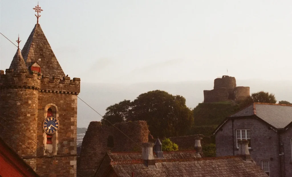 Town Hall Clock Tower with Castle in the Distance