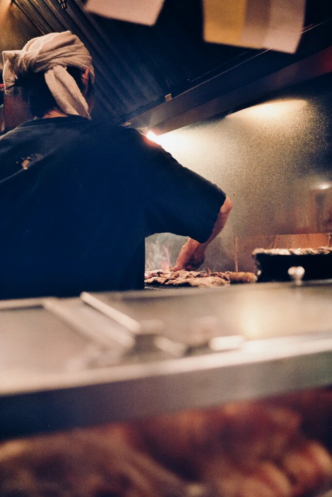 yakitori chef at the grill