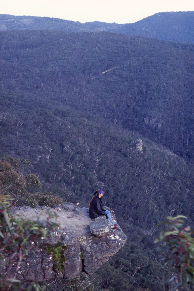 4 Catherine checking out the view from an overhang at Gariwerd (otherwise known as Grampions National Park) in western Victoria.