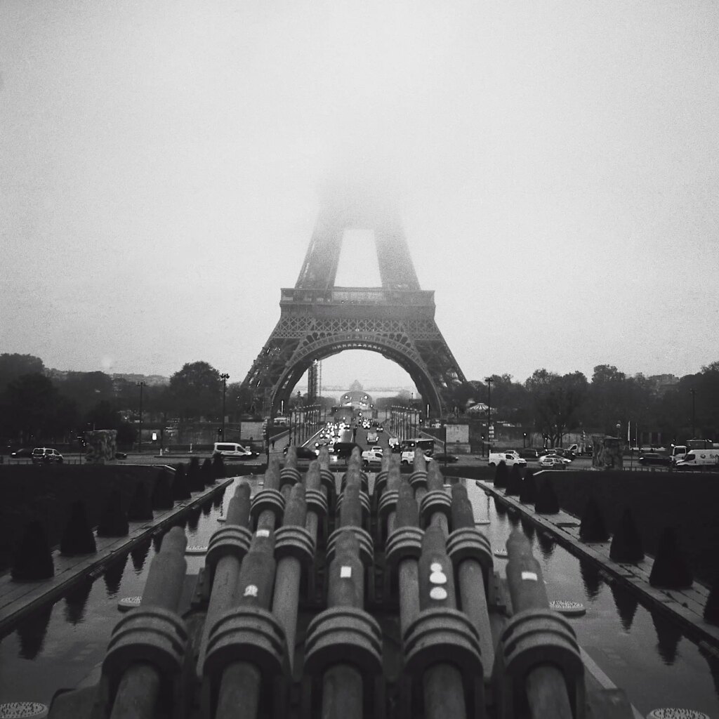 Eiffel Tower in the fog at sunrise on black and white film