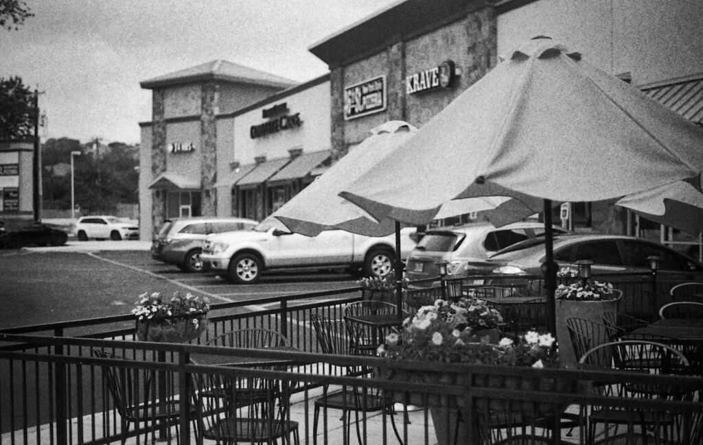 Lighter and higher-contrast photo of Patio and parking lot