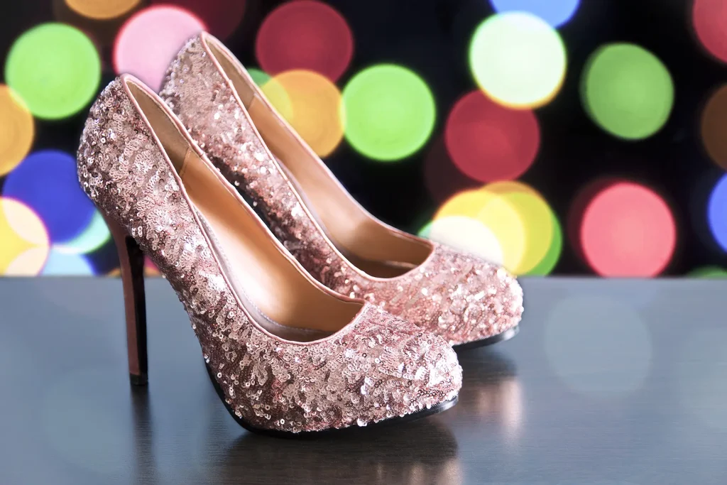 Sparkly shoes in front of bokeh lights
