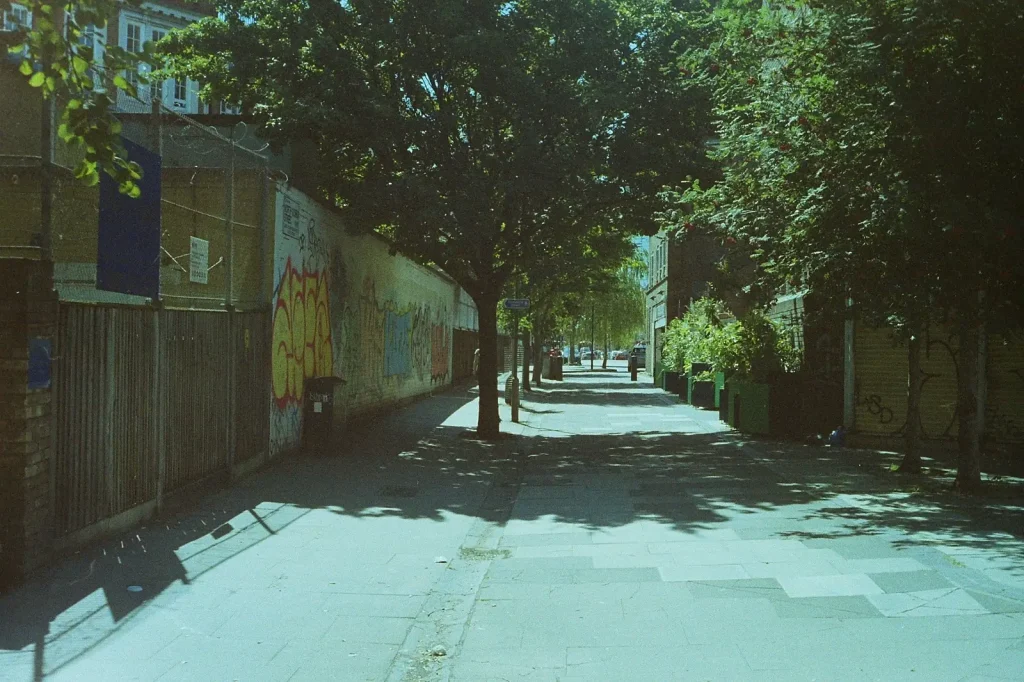 street in london with graffiti on wall