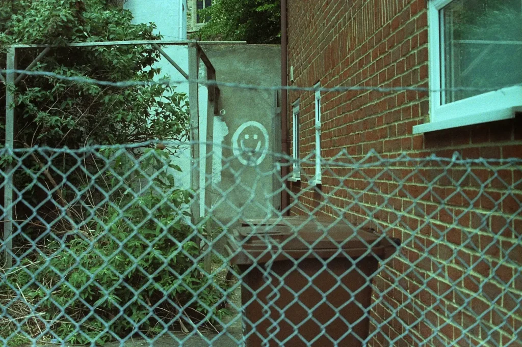 smiley face painted on wall