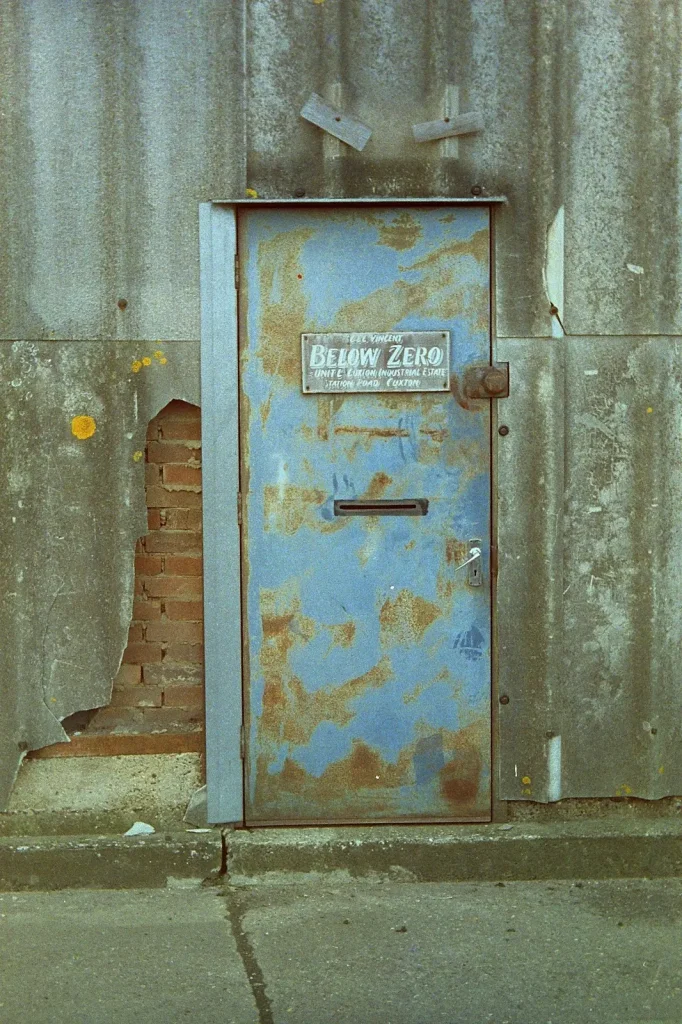 photo of a blue rusty door