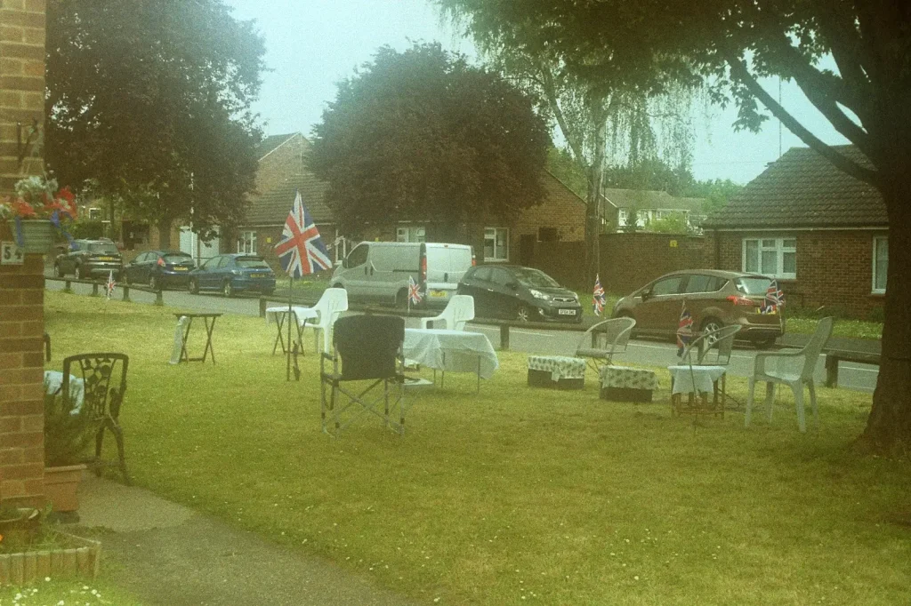 photograph of outside chairs and bunting