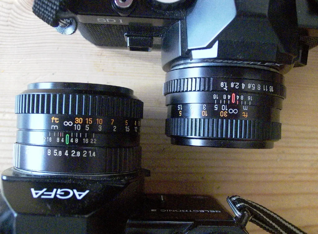 a photo showing two 5omm lenses