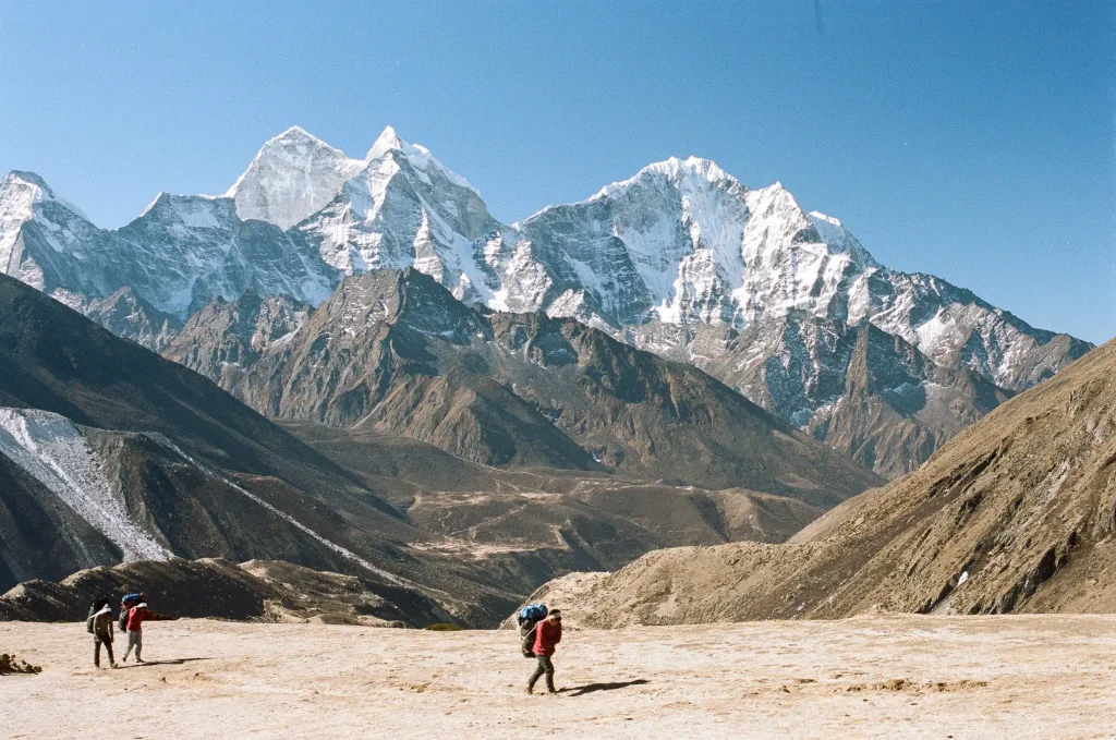 Mountain scene with porters