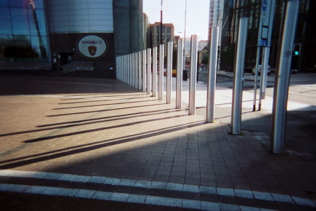 street architecture silver poles in a row