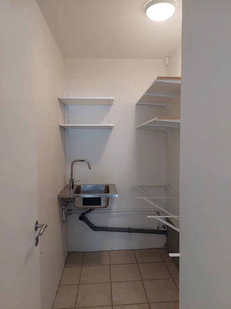shelves, empty room, sink, pipes