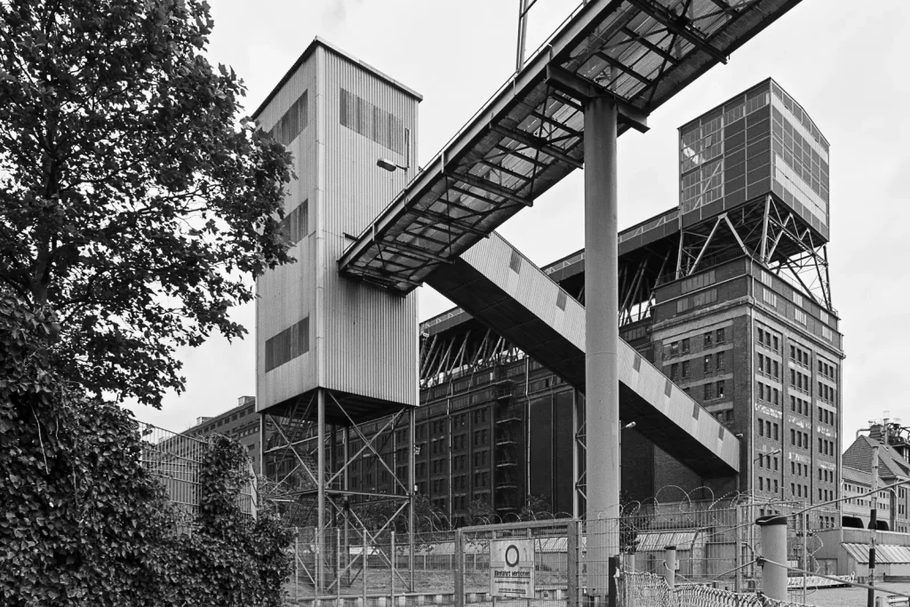 Large grain storage and loading facility ("der Koloss") at Bremen ports shot on Fuji Acros black-and-white film.