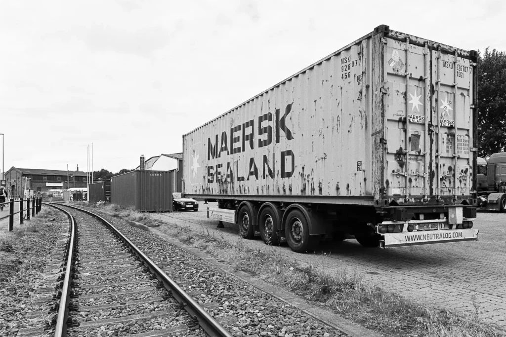 Rusty 40 foot container parked at Bremen ports, shot on Fuji Acros black-and-white film.
