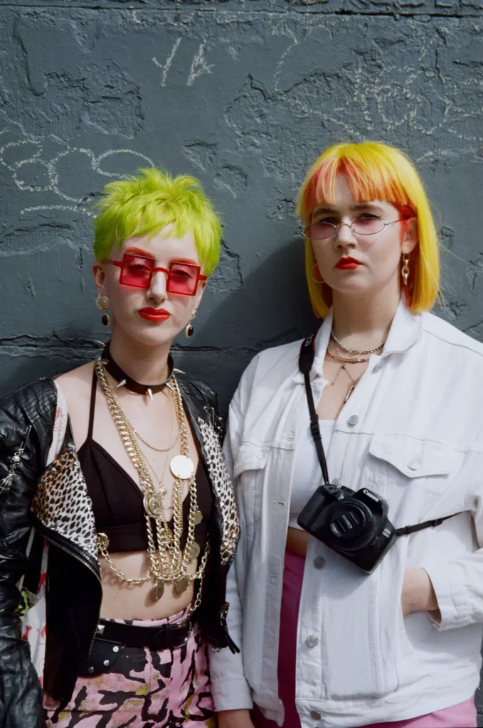 Canon Sureshot Zoom XL portrait of two women with yellow and green hair