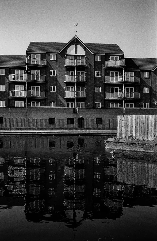 Chinon Bellami photograph of house near river