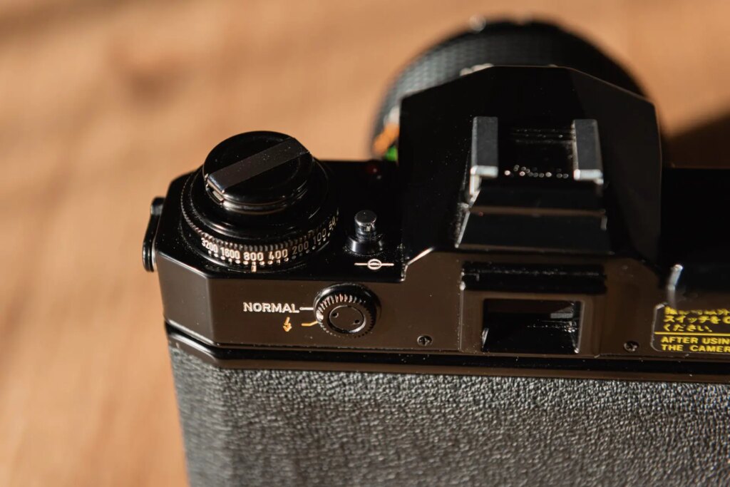 ASA dial, exposure lock and CAT switch of the Canon EF camera