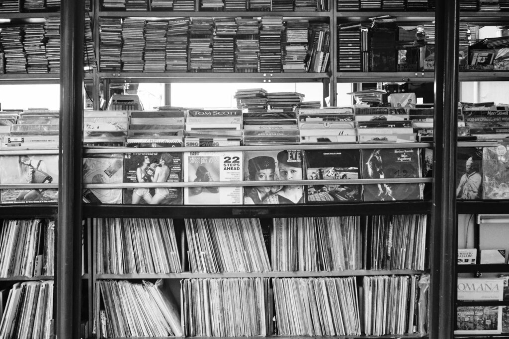 Outdoor kiosk music shop with used vinyl and cassettes, Salerno Italay.