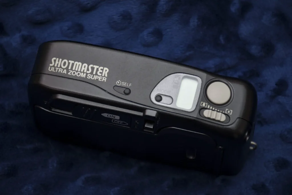Ricoh Shotmaster Ultra Zoom Super top