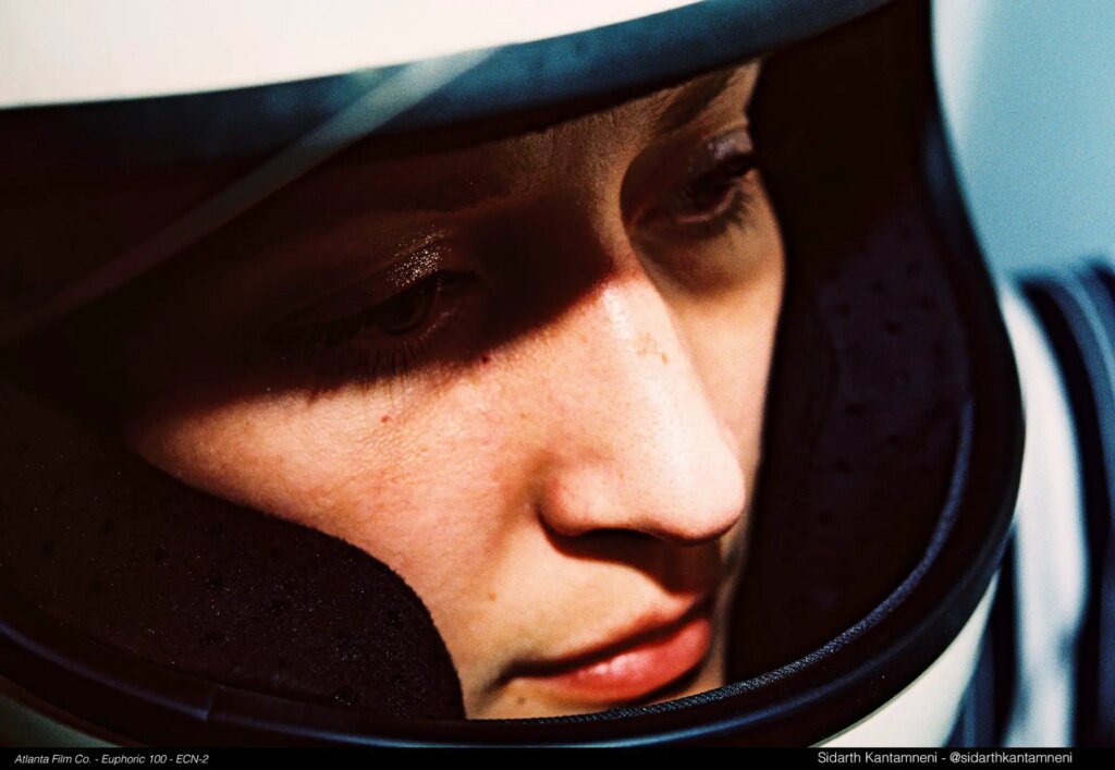 portrait of person wearing a helmet close up