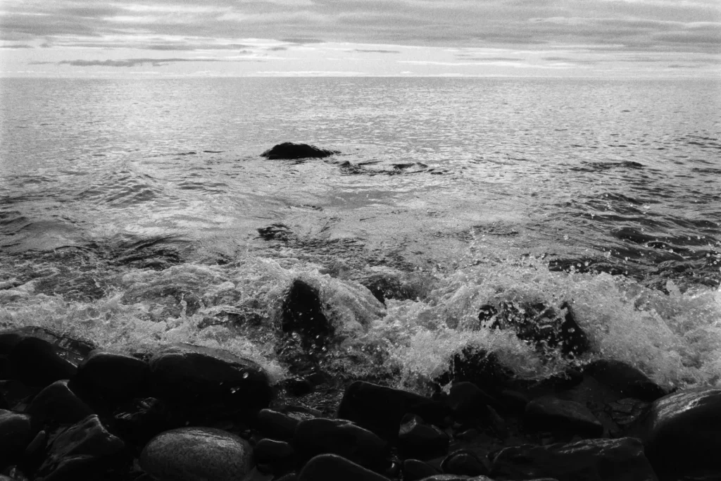FE Nikon with 28mm lens ultrafine 400 lake superior shore and waves